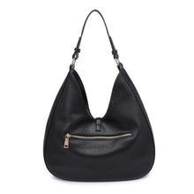 Load image into Gallery viewer, Back view of the black pebbled vegan-leather hobo bag featuring a gold zippered pocket, displayed against a white background. 