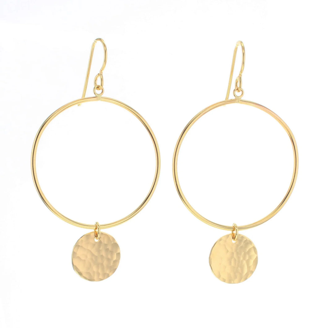 14K gold-filled hoop earrings featuring a hand-hammered round disc charm on each, displayed on a white background. 