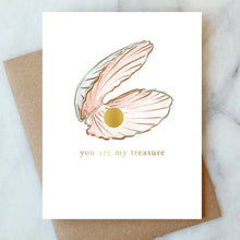 Load image into Gallery viewer, Greeting card with oyster shell and gold pearl illustration and "you are my treasure" text, shown with a brown kraft envelope on marble surface.