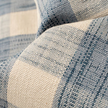 Load image into Gallery viewer, Close-up of a blue-and-cream gingham table runner showing its textured woven fabric.