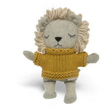 Load image into Gallery viewer, Plush merino-wool lion with a gray body, cream yarn mane, black embroidered facial features, and a mustard yellow knitted sweater, displayed standing against a white background. 
