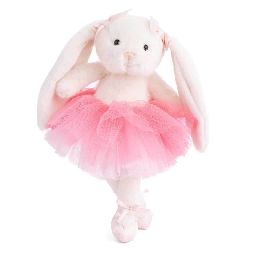 Plush white rabbit with long ears and bows wearing a pink tulle tutu standing against a white background.