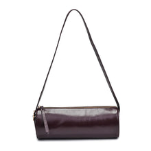 Load image into Gallery viewer, Dark brown vegan leather cylindrical shoulder bag with a long shoulder strap and a top zipper pull, displayed against a white background.