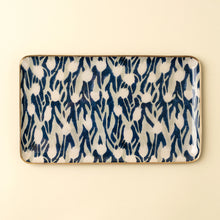 Load image into Gallery viewer, Rectangular enameled tray with blue-and-white floral pattern and painted gold edging on a white background.