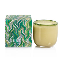 Load image into Gallery viewer, Serena St. Barth double-wick candle in translucent yellow-green container with darker rim, beside branded Serena St. Barth patterned box, displayed on a white background. 