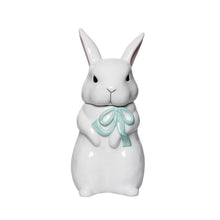 Load image into Gallery viewer, White ceramic rabbit cookie jar with removable head lid and soft green bow on white background.