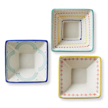Load image into Gallery viewer, Square stoneware Geo dish with blue, yellow, and teal rims featuring clean lines, displayed on a white background. 