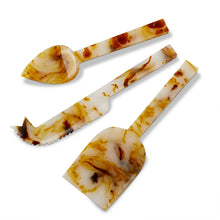 Load image into Gallery viewer, Tortoise Resin Cheese Utensil Set of three stainless steel utensils with tortoise shell resin design in ivory, brown, and amber tones including spreader, fork, and knife, displayed on white background. 