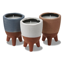 Load image into Gallery viewer, Footed Citro Candle Pot assorted colors with blue, gray, and terracotta upper halves and brown bottoms, hand poured citronella candles with single wicks in three leg footed pots, displayed together against white background.