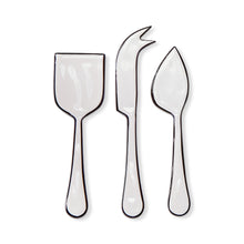 Load image into Gallery viewer, Monroe Enml Cheese Utensil Set three white stainless steel utensils including a cheese knife, cheese fork, and cheese server with white enamel finish and black outline design, displayed side by side against white background. 