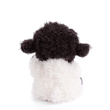 Load image into Gallery viewer, Back view of fluffy sheep plushie with wooly black head and white body in seated position on a white background.