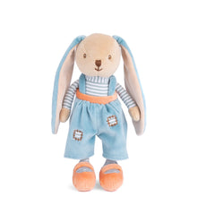 Load image into Gallery viewer, Little Bunny Brothers plush bunny in blue pants with soft fabric body, beige head and hands with brown stitched facial details, long blue floppy ears with beige interiors, blue and white striped turtleneck, blue overalls with stitched patch detail, and orange shoes, displayed on a white background. 