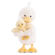 Load image into Gallery viewer, Dougie and Mama plush ducks with soft coats, featuring a larger white duck embracing a smaller yellow duck, both with yellow beaks and feet and black bead eyes, displayed on a white background. 