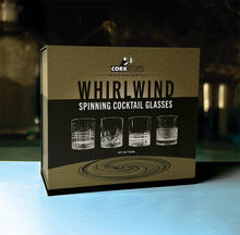 Load image into Gallery viewer, Whirlwind spinning cocktail glasses set of four shown in branded gold and black box with assorted textured glass styles, displayed on a white surface. 