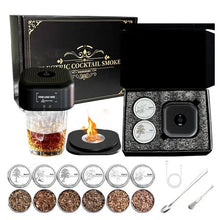 Load image into Gallery viewer, Electric cocktail smoker kit with glass, black smoking lid, six assorted wood chips, USB charging cord, and tools arranged with open black gift box packaging, displayed on a white background.