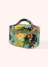 Load image into Gallery viewer, Quilted cotton velvet vanity case featuring a multicolor floral pattern in yellow, purple, green, and pink on a light turquoise background, with a structured top handle and zip-around closure, displayed on a white background. 