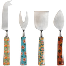 Load image into Gallery viewer, Mosaic cheese knife set of four with stainless steel blades and assorted block print handles in yellow floral on green, pink floral on blue, green and pink floral on yellow, and yellow floral on brown patterns, glossy finish, displayed on a white background. 