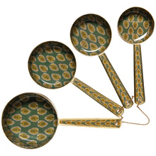Load image into Gallery viewer, Brio enameled steel measuring cups with green and gold block print leaf pattern and matte gold finish, set of four, displayed on a white background. 