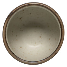 Load image into Gallery viewer, Danica Heirloom stoneware egg cup, top view, cream speckled interior with brown rim, displayed on a white background. 
