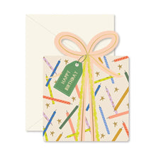 Load image into Gallery viewer, Happy Birthday Present Card, present-shaped greeting card with illustrated gift box wrapped in blush pink ribbon, bow, green Happy Birthday tag, colorful candles, and gold stars with white envelope, displayed ivory background.  