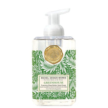 Load image into Gallery viewer, Michel Design Works Greenhouse foaming shea butter hand soap pump bottle with gold seal and white botanical pattern on green background against a white background. 