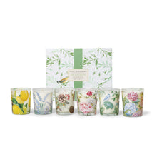 Load image into Gallery viewer, Favorite Fragrances votive sampler gift set featuring six glass votive candles, each  with a unique botanical or fruit design including lemons, lavender, peony, and birds, displayed in front of a coordinating patterned gift box on a white background. 