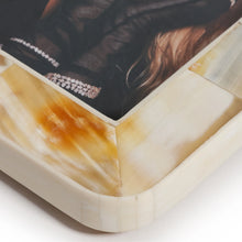 Load image into Gallery viewer, Close-up of Zodax Dune African white horn photo frame corner showing white rectangular inlay tiles with surrounding marbled white, cream, and amber tones. 