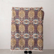 Load image into Gallery viewer, Tibetan Tigers Cotton Slub Printed Throw, vertical full view of plum printed throw blanket with repeating golden honey and dark brown tiger motifs, teal and beige geometric accents with fringe ends, against white background. 