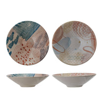 Load image into Gallery viewer, Abstract Design Stoneware Bowl, two assorted round stoneware bowls with abstract blue, blush, terracotta, and cream  interior designs featuring small floral and dotted circle motifs, white exterior, shown in overhead and side profile views against white background.  