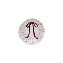 Load image into Gallery viewer, White round ceramic dish with a pink and red wreath and bow design , against a white background.