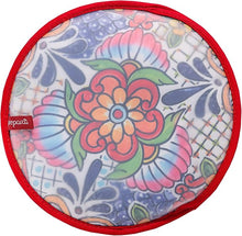 Load image into Gallery viewer, Day of the Dead Fabric Tortilla Warmer, round with colorful floral and tile-inspired pattern and red trim, displayed on white background. 