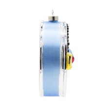 Load image into Gallery viewer, Caviar Ornament, side view of an oval glass ornament with a light blue center, silver edges, a row of raised glossy black pearls, a gold pull tab with a red accent, and a silver-tone hanging cap, against a white background. 