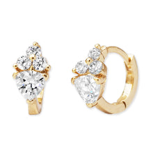 Load image into Gallery viewer, Tiny Triple CZ with Triangle Diamond Huggie, pair of gold-plated huggie hoop earrings with one large triangle-cut and three round cubic zirconia stones arranged in a row against a white background. 
