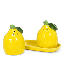 Load image into Gallery viewer, Lemon Salt &amp; Pepper Shakers, glossy yellow ceramic lemon-shaped salt and pepper shakers with light green stems and dark green leaves, displayed with a matching yellow ceramic oblong tray, against a white background. 